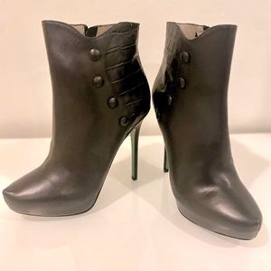 Donald J. Plisner black booties.